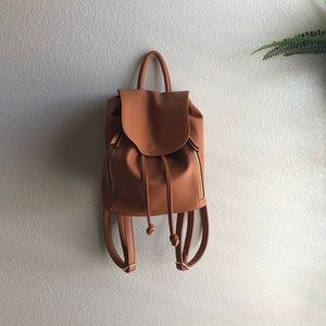 Brown faux leather backpack